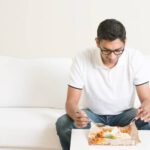 man having thanksgiving dinner alone