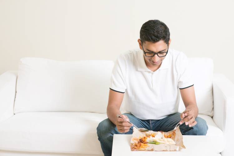 man having thanksgiving dinner alone