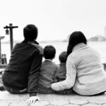 family looking over water