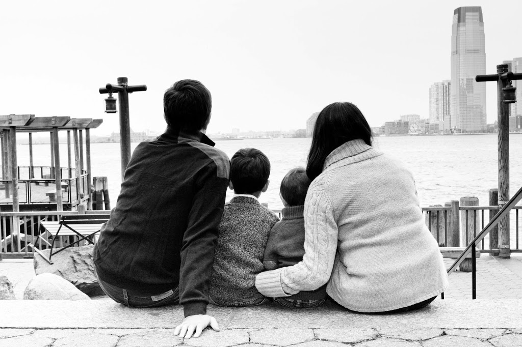 family looking over water