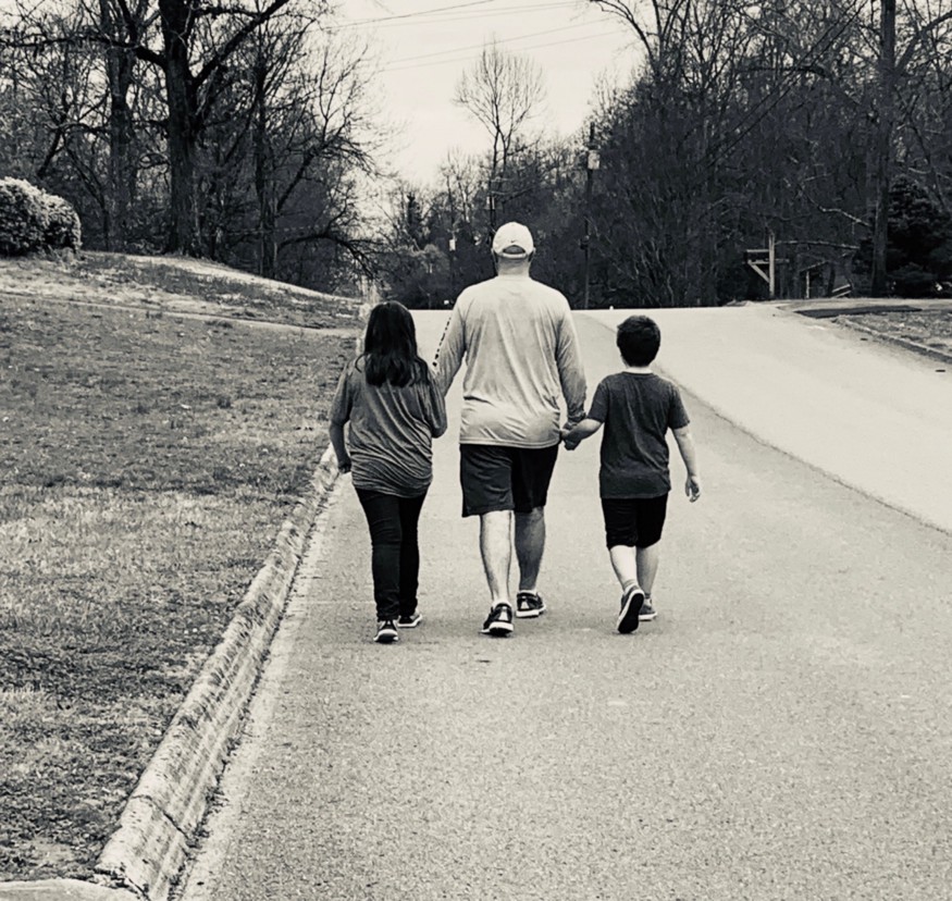 Father Walking With Kids