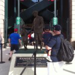 Baseball fans with the statue of Shannon Stone and Cooper Stone at Globe Live Park