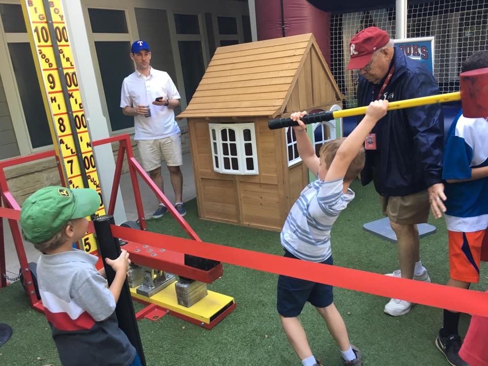 David's son taking a break from the baseball action and playing the hammer game. We'll let you decide if the hammer went forward or the kid went backwards.
