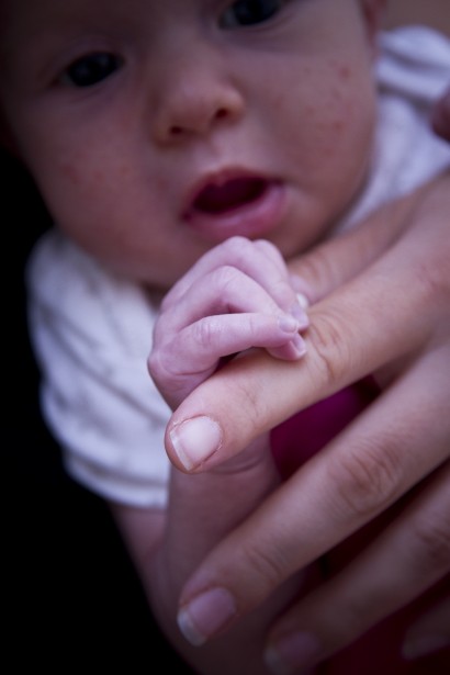 baby holding hand