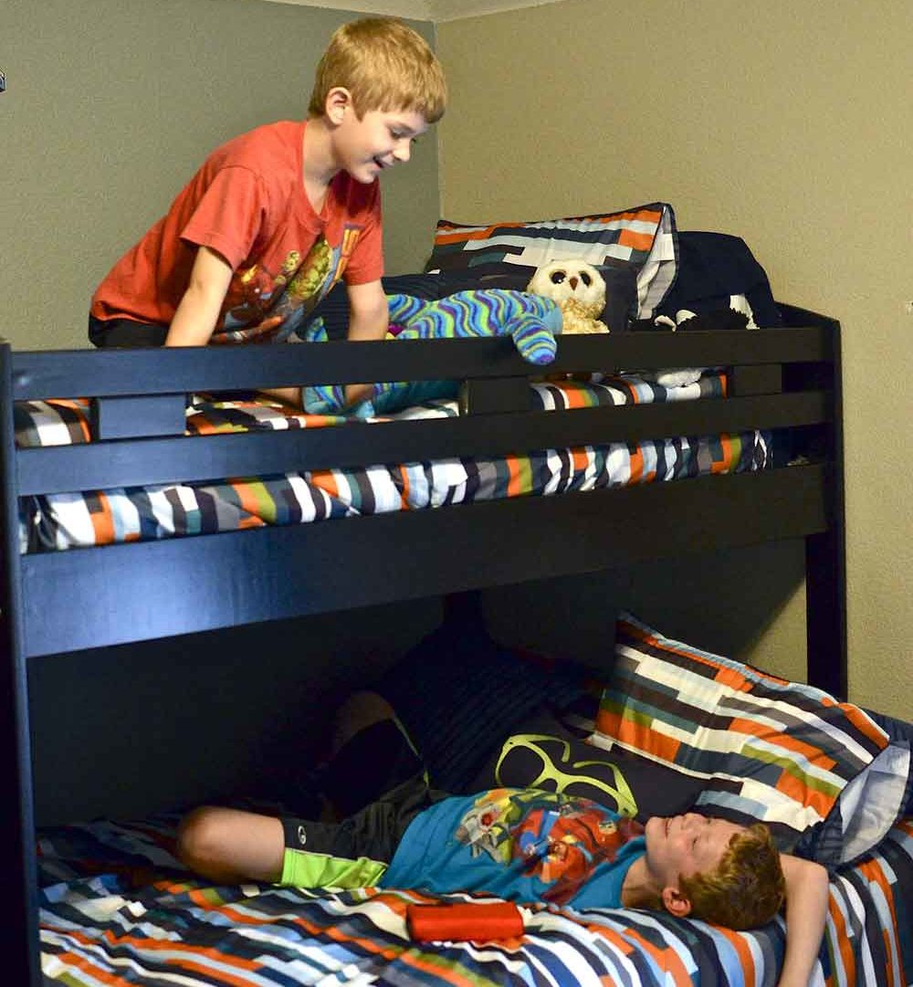 boys in bunk bed talking in bedroom
