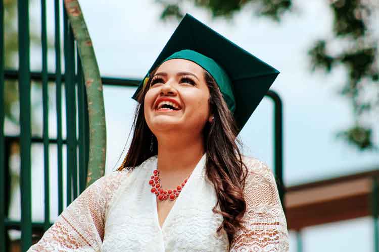 college search tips woman in graduation cap
