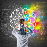 daddy brain child on father's shoulder