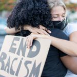 end racism black white woman hug teach your children 1