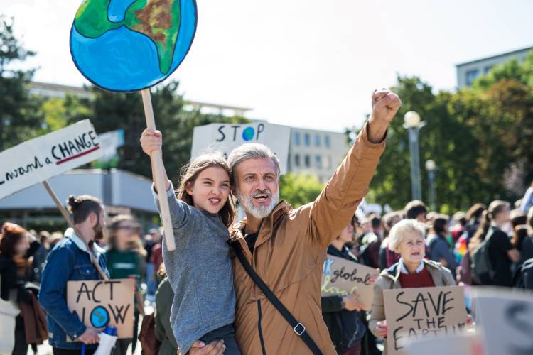 father daughter protest march climate change 1