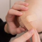 bandage on child's elbow first blood