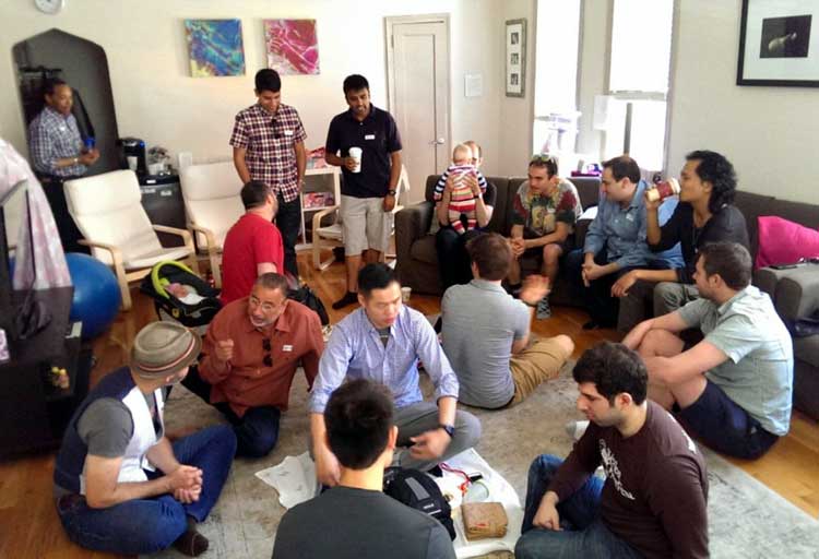 A New Dad Boot Camp class brings together new and expecting fathers to learn the basics of baby care from veteran dads.