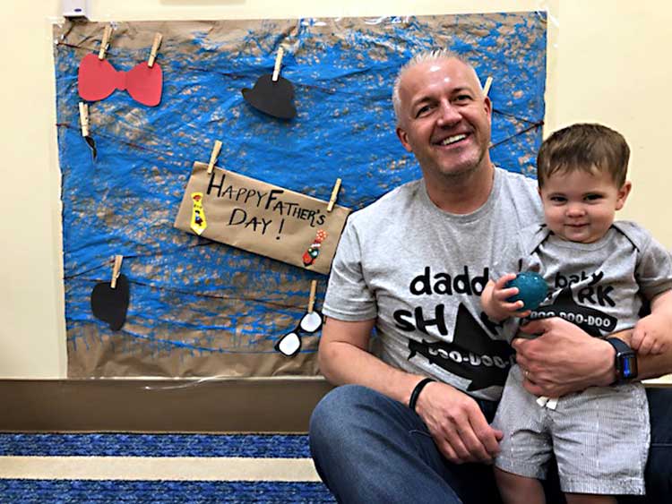 Michael Andersen-Leavey and his son. Cole, with whom he took 20 weeks of paid paternity leave to care for after his birth