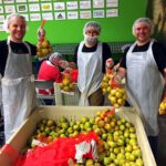 Portland Dads Group members packages fruit to distribute to families in need at the Oregon Food Bank during Giving Tuesday 2017 activities. (Photo: Portland Dads Group)