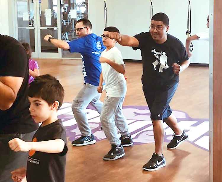 nyc dads group and kids take a boxing class at crunch gym