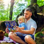 father reads to child reading routine