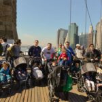 dads with strollers on brooklyn bridge