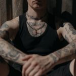 tattoos man sitting personal choices