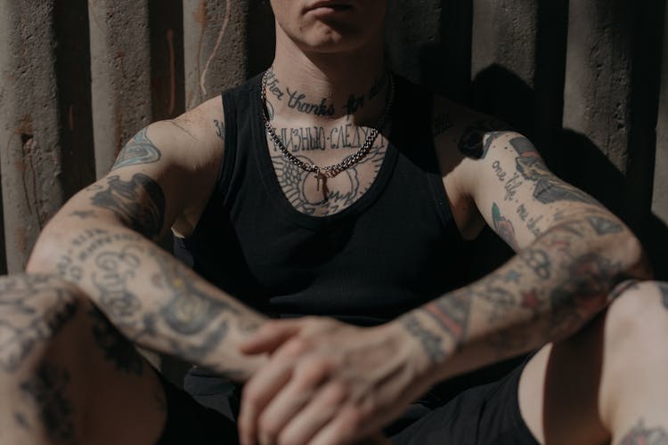 tattoos man sitting personal choices