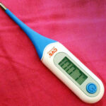 thermometer fever sick child