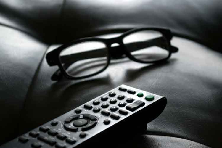 late show TV watching remote control glasses